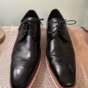 Elegant Black Men's Oxfords with Red Sole